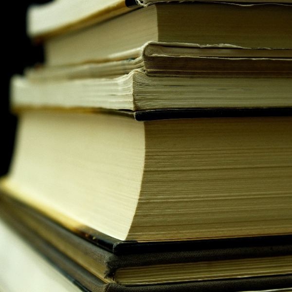 Dale–Chall Readability Scorer A pile of large books